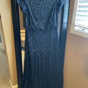 Navy blue , long to the floor dress.
